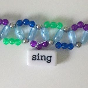 cute sing bracelet, sing charm can be removed nwot